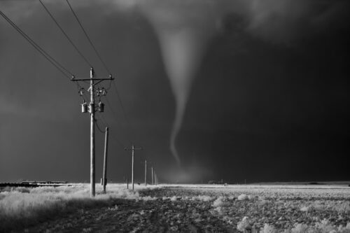 Tornado crossing power poles