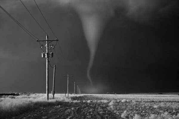 Tornado crossing power poles